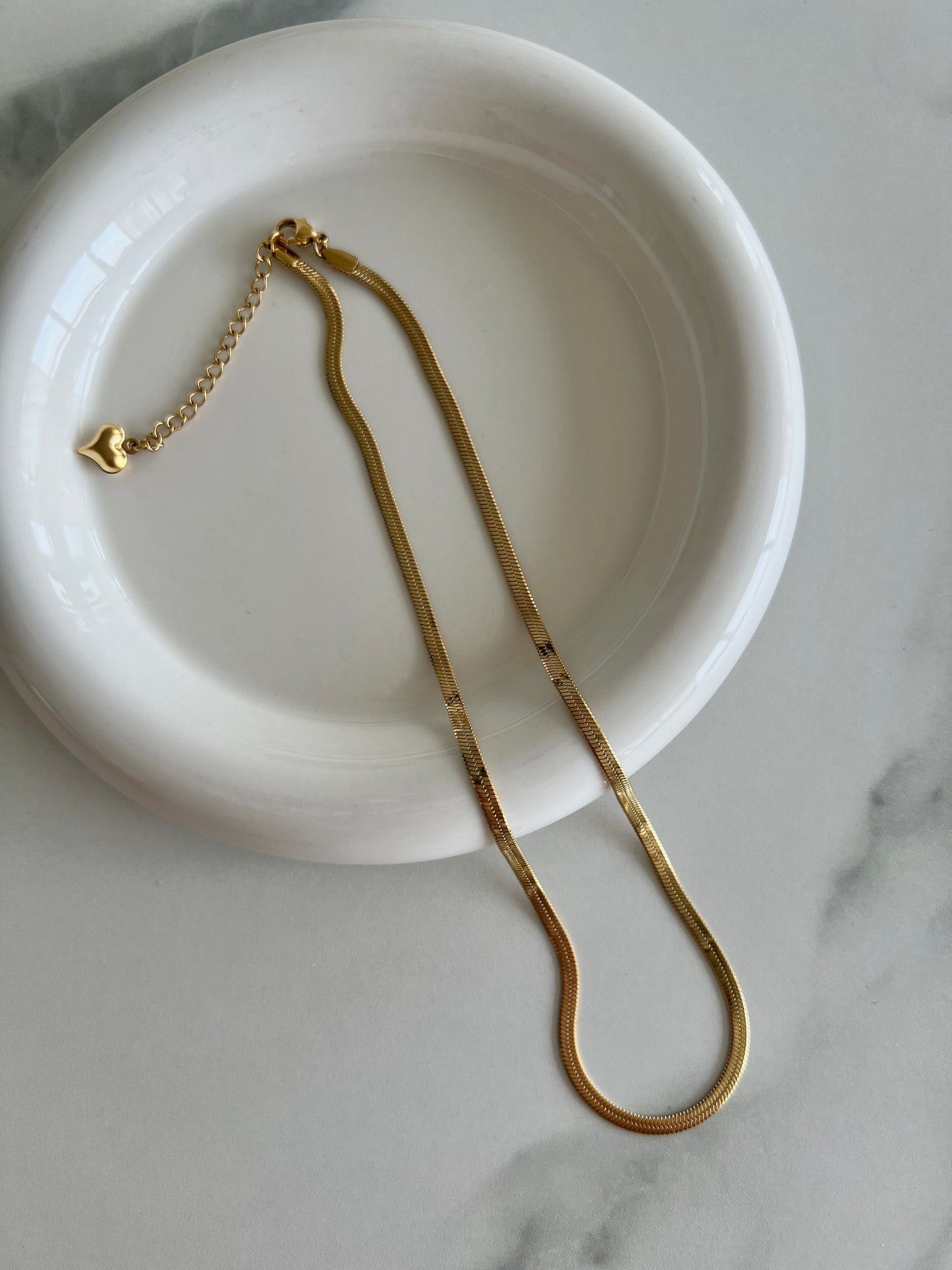 Golden Snakebone Necklace with Heart Pendant