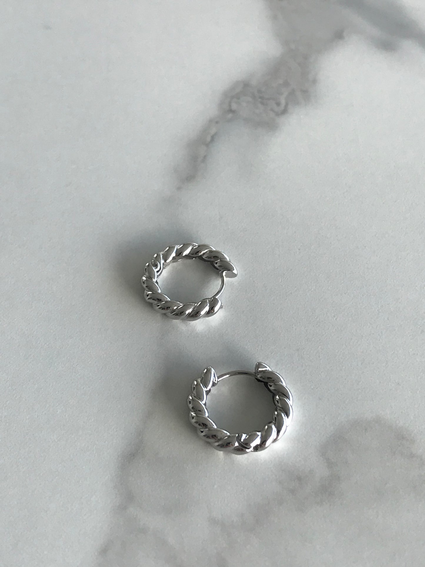 Small twisted silver hoops