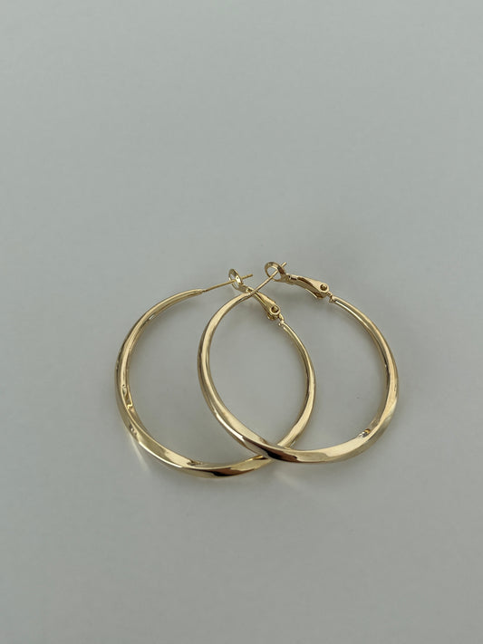 Golden twisted hoops