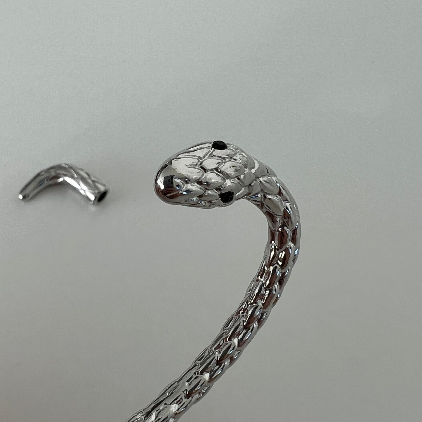 Single serpent ear cuff