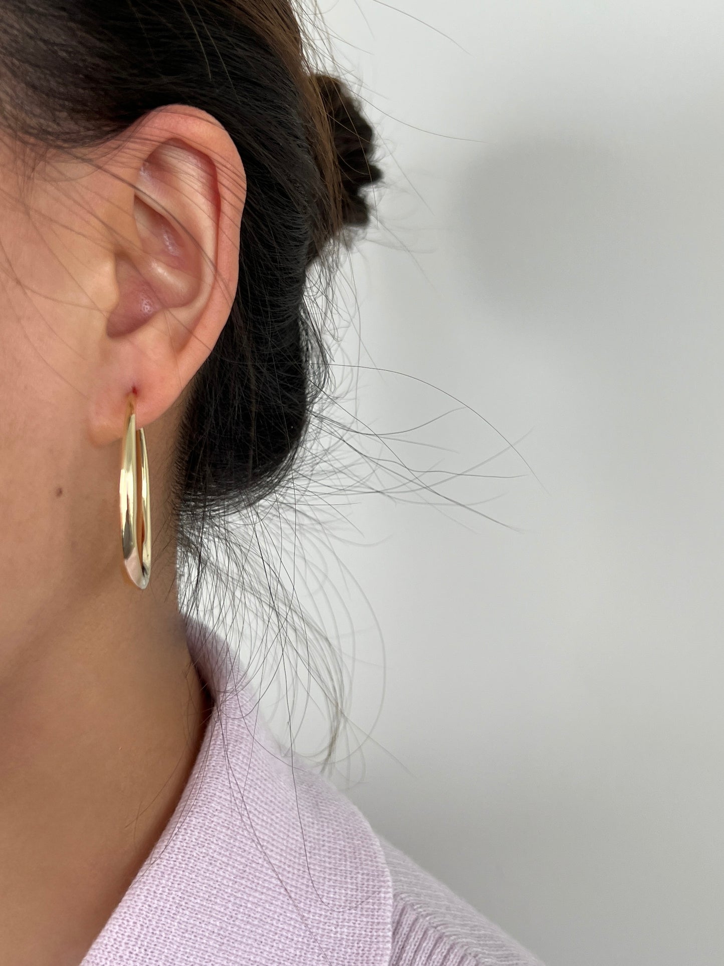 Golden twisted hoops