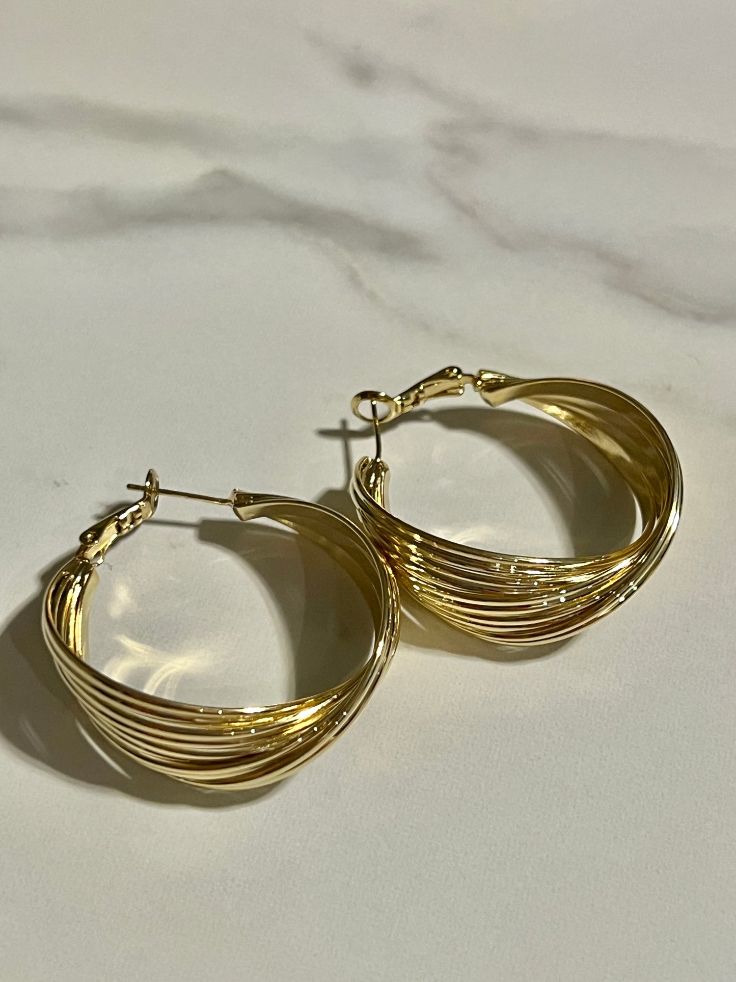 Mobius Golden Metal Hoop Earrings